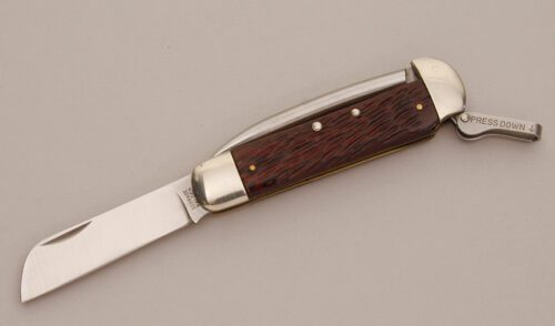 Schrade Cutlery Model 735 Rigging Knife with Jigged Delrin Scales handle material - Obverse Side - Item #KLC11613