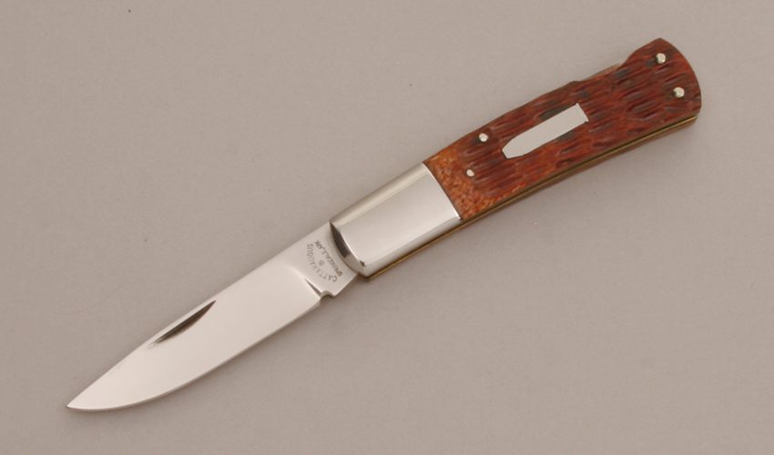 Cattaraugus Cutlery KCC CM-10 Barlow Lockback with Brown Jigged Bone Scales handle material - Obverse Side - Item #KLC11645