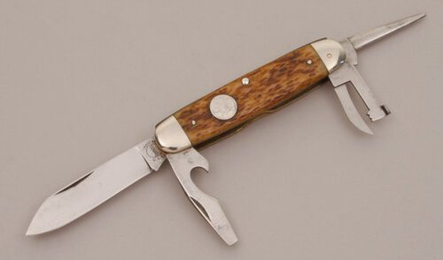 Remington Knives RS3333 Boy Scout Knife with Brown Jigged Bone Scales handle material - Obverse Side - Item #KLC11651