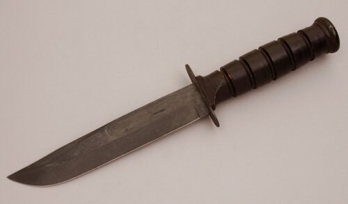 Camillus Cutlery Combat Knife with Leather Handle handle material - Obverse Side - Item #KLC11666
