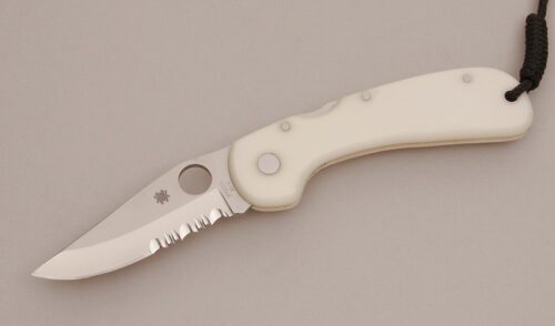 Spyderco Knives C18PSWH Wayne Goddard Lockback with White Micarta Handle Scales handle material - Obverse Side - Item #KLC11681