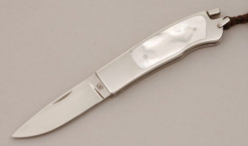 A.G. Russell Ron Lake Design Tail Lock with Stainless Steel Frame handle material - Obverse Side - Item #KLC11742