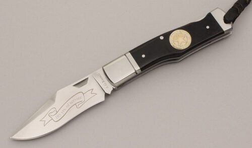 A.G. Russell 2008 Texas Ranger Lockback with Black Micarta Handle handle material - Obverse Side - Item #KLC11847