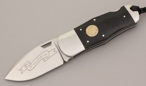 A.G. Russell 2010 Texas Ranger Lockback with Ebony Rucarta Scales handle material - Obverse Side - Item #KLC11849