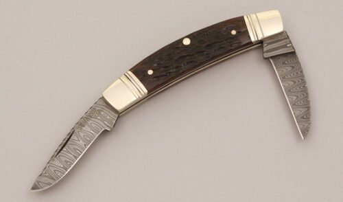 Schrade Cutlery Joe Kious Reverse Congress with Brown Jigged Bone Scales handle material - Obverse Side - Item #KLC11856