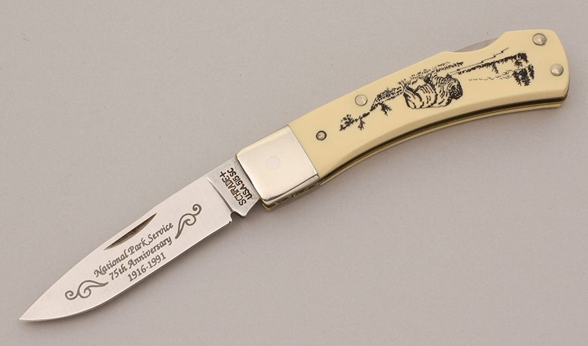 Schrade Cutlery National Park Service Lockback with Ivory Delrin Scales handle material - Obverse Side - Item #KLC11867