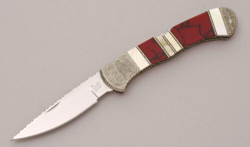 Buck Knives Painted Pony Bucklock with Gold Lip Pearl & Bloody Jasper handle material - Obverse Side - Item #KLC12016