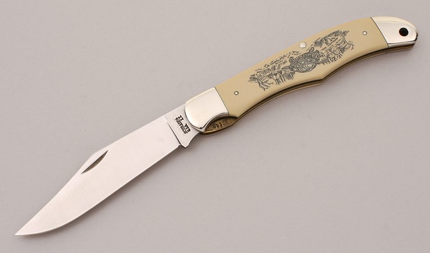 Schrade Cutlery Folding Hunter with Ivory Delrin Scales handle material - Obverse Side - Item #KLC12057