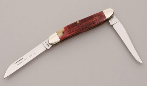 Case Cutlery Hawbaker's Special Muskrat with Dark Red Jigged Bone Scales handle material - Obverse Side - Item #KLC12105