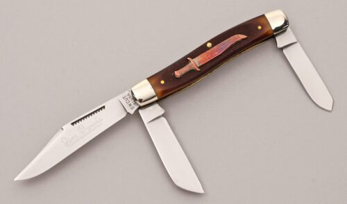 Schrade Walden JB1 Jim Bowie Commemorative with Sawcut Delrin Scales handle material - Obverse Side - Item #KLC12122