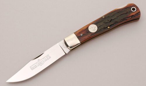 Queen Cutlery Mountain Man Lockback with Honey Amber Stag Bone Scales handle material - Obverse Side - Item #KLC12174
