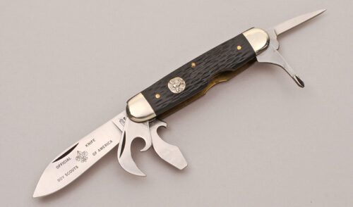 Camillus Cutlery Boy Scout Knife with Black Jigged Delrin Scales handle material - Obverse Side - Item #KLC12185