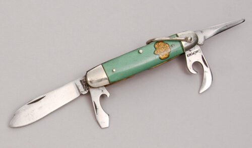 Kutmaster Girl Scout Knife with Green Plastic Handle Scales handle material - Obverse Side - Item #KLC12311
