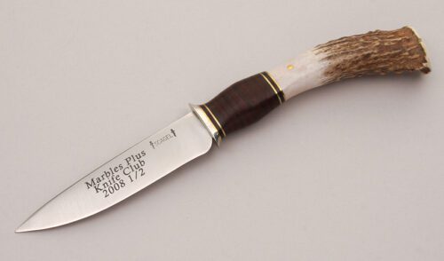 Marble's Knives 2008-1/2 Club Knife with Stag & Leather Handle handle material - Obverse Side - Item #KLC12353
