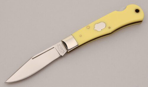A.G. Russell Lockback Folder with Yellow Delrin Scales handle material - Obverse Side - Item #KLC12481