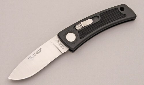 Gerber Knives 7023 Bolt Action Exchanger with Glass Filled Nylon Handle handle material - Obverse Side - Item #KLC12513