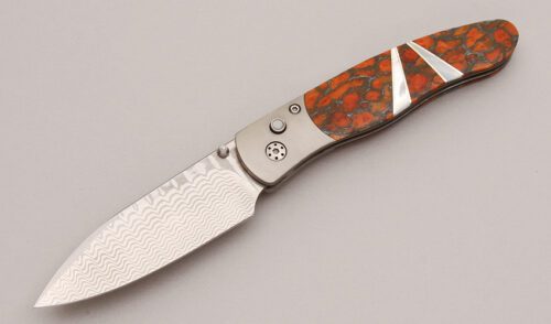 Santa Fe Stoneworks Large Damascus Button Lock with Zinc Coral/Mother of Pearl handle material - Obverse Side - Item #KLC12535