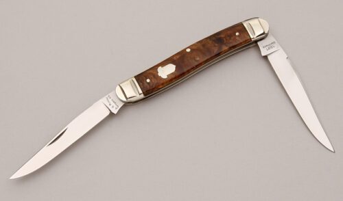 A.G. Russell Large Muskrat with Brown Onyx Celluloid Scales handle material - Obverse Side - Item #KLC12546