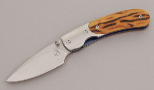 William Henry Knives T09 Kestrel Linerlock Folder with Amber Jigged Bone Scales handle material - Obverse Side - Item #KLC12617