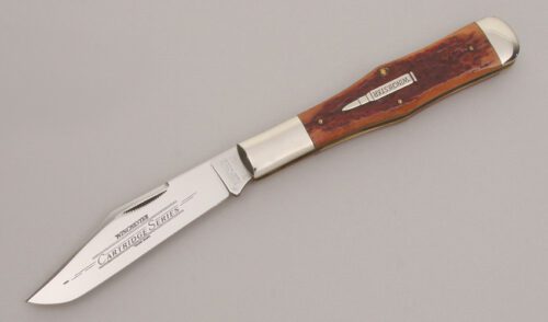 Winchester Knives W18 19106 Coke Bottle Folder with Orange Jigged Bone Scales handle material - Obverse Side - Item #KLC12650