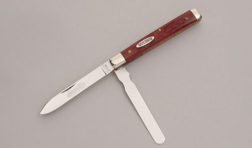 Robeson Knives 622114 ShurEdge Doctors Knife with Dark Red Jigged Bone Scales handle material - Obverse Side - Item #KLC12655