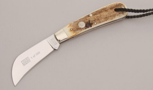 Queen Cutlery Joe Pardue Design Hawkbill with Torched Sambar Stag Scales handle material - Obverse Side - Item #KLC12759