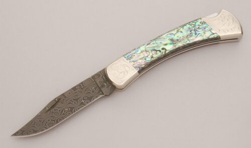 Buck Knives Model 110 Custom Jeff Legerton with Paua Shell Handle Scales handle material - Obverse Side - Item #KLC12768