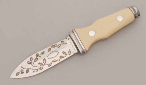 A.G. Russell 1977 Sting with Ivory Micarta Scales handle material - Obverse Side - Item #KLC12771