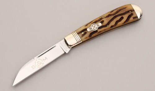 Schatt & Morgan 041001 Swayback Clasp Knife with Morning Ash Worm Groove Bone handle material - Obverse Side - Item #KLC12882
