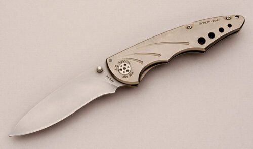 A.G. Russell Tactical Framelock Folder with Titanium Frame handle material - Obverse Side - Item #KLC12896