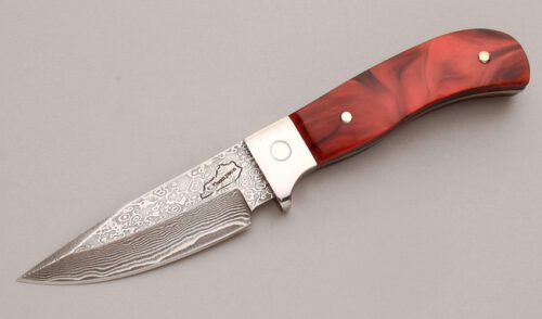 Jim Thompson Damascus Drop Point Skinner with Red Acrylic Handle Scales handle material - Obverse Side - Item #KLC12908