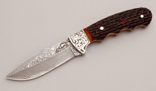 Jim Thompson Damascus Gambler/Skinner with Red Jigged Bone Scales handle material - Obverse Side - Item #KLC12909