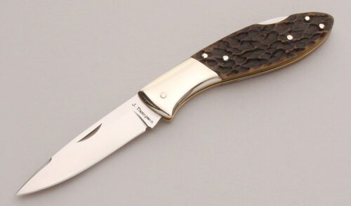 Jim Thompson Lock Back Folder with Green Jigged Bone Scales handle material - Obverse Side - Item #KLC12912