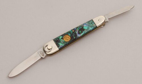 Canal Street Cutlery Sleeveboard Ring Opener with Paua Shell Scales handle material - Obverse Side - Item #KLC12944