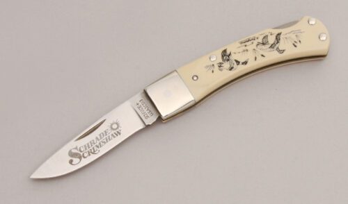 Schrade Cutlery SC513 Scrimshaw Lockback with Ivory Delrin Handle Scales handle material - Obverse Side - Item #KLC12977