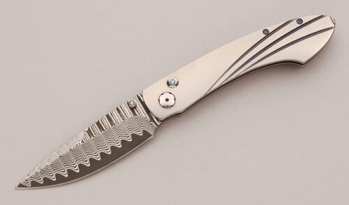 William Henry Knives B12 FTD Button Lock with Aerospace Titanium Frame handle material - Obverse Side - Item #KLC13018