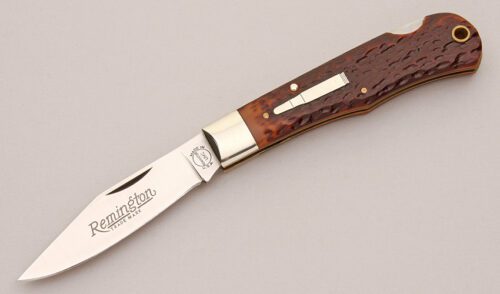 Remington Knives R1303 Bullet Lockback with Jigged Delrin Handle Scales handle material - Obverse Side - Item #KLC13110