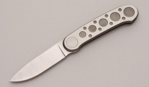 Pacific Cutlery Barry Wood Butterfly Folder with Machined Stainless Frame handle material - Obverse Side - Item #KLC13114