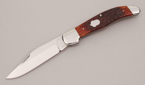 A.G. Russell KCC FH-2 Folding Hunter with Brown Jigged Bone Scales handle material - Obverse Side - Item #KLC13120
