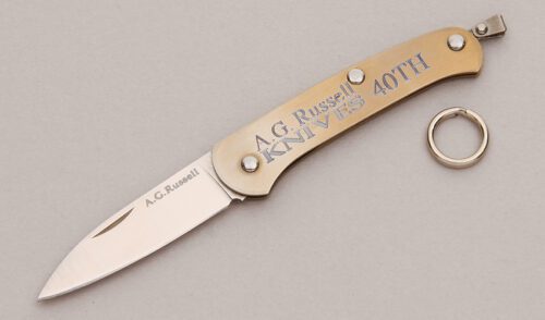 A.G. Russell 40TH Anniversary Pen Knife with Gold Anodized Titanium Frame handle material - Obverse Side - Item #KLC13127