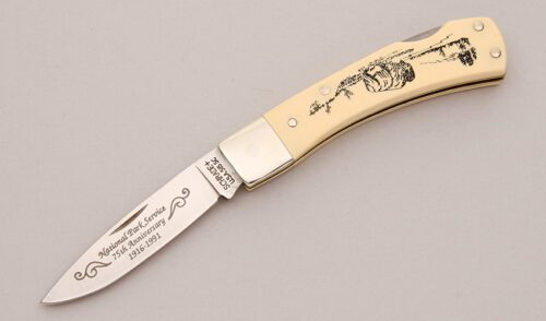 Schrade Cutlery National Park Service Lockback with Ivory Delrin Scales handle material - Obverse Side - Item #KLC13134