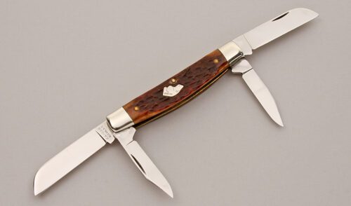 Ka-Bar Knives Dog Head Congress with Jigged Bone Scales handle material - Obverse Side - Item #KLC13159