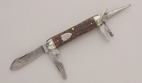 Ulster Knives Model 1502 Boy Scout Knife with Brown Jigged Bone Scales handle material - Obverse Side - Item #KLC13207