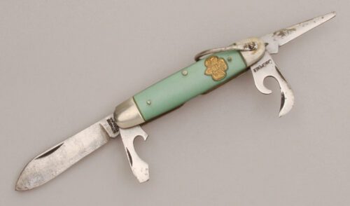 Kutmaster Girl Scout Knife with Green Plastic Handle Scales handle material - Obverse Side - Item #KLC13213