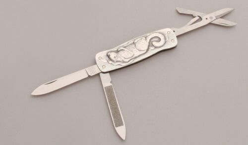 Wenger Knives Nature Series Snow Leopard with Embossed Aluminum Frame handle material - Obverse Side - Item #KLC13255