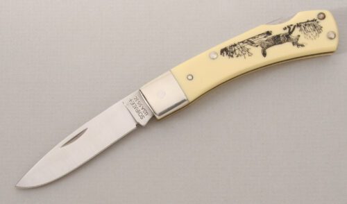 Schrade Cutlery 515SC Scrimshaw Lockback with Ivory Delrin Scales handle material - Obverse Side - Item #KLC13320