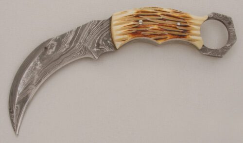 Unknown Maker Damascus Karambit with Jigged Bone Scales handle material - Obverse Side - Item #KLC13327