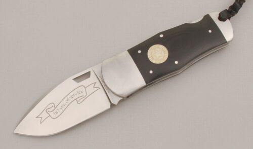 A.G. Russell 2010 Texas Ranger Lockback with Ebony Rucarta Scales handle material - Obverse Side - Item #KLC13393