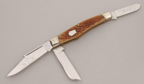 Schatt & Morgan 043150 Large Reverse Gunstock with Jigged Bone Scales handle material - Obverse Side - Item #KLC13416