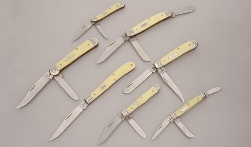 Case Cutlery 1989 Pure Gold Mint Set with Yellow Delrin Handle Scales handle material - Obverse Side - Item #KLC13419